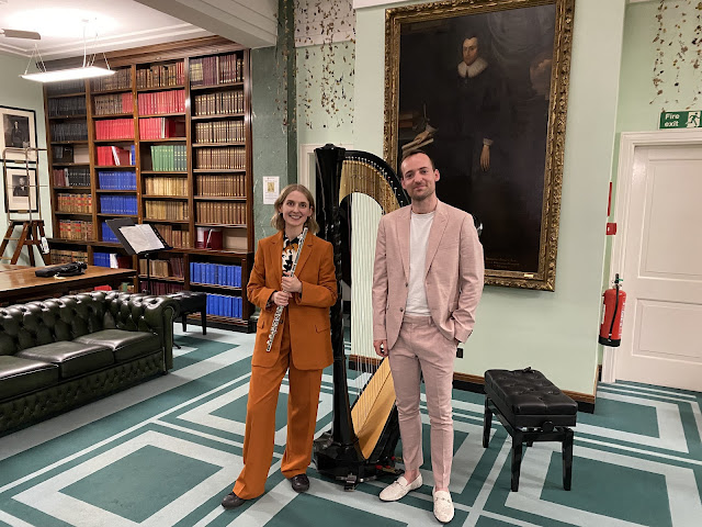 Siren Duo (Claire Wickes, flute, and Tomos Xerri, harp) in Middle Temple Library.