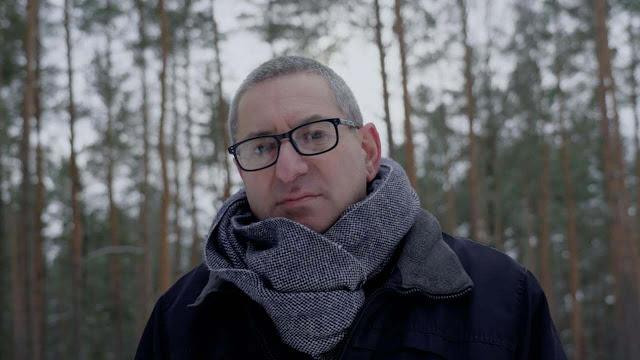 Michael Zev Gordn at site of his grandfather's murder in Summer 1941.