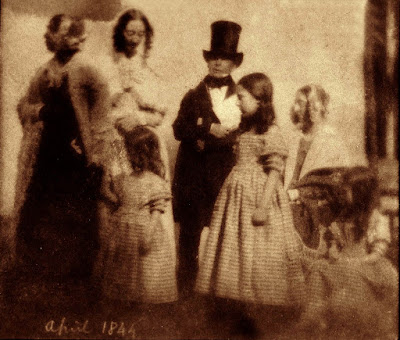 Moore stands centre in a photograph by William Henry Fox Talbot dated April 1844 Moore stands centre in a photograph by William Henry Fox Talbot dated April 1844