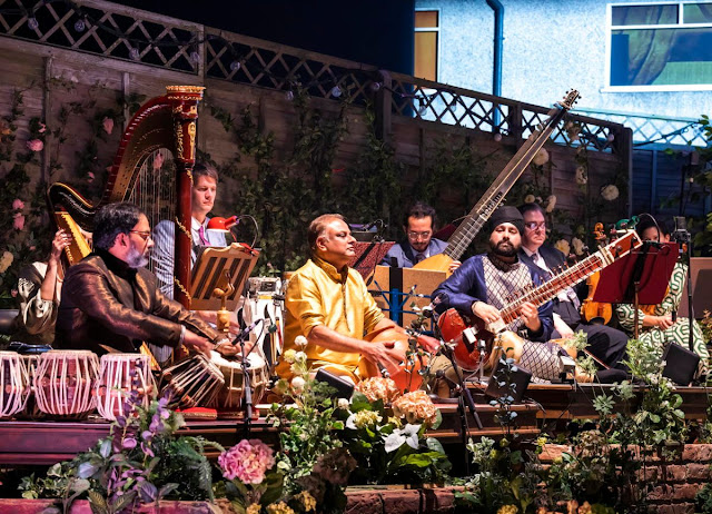 Monteverdi/Jasdeep Singh Degun: Orpheus - Shahbaz Hussain on tabla, RN Prakash on ghatam, Mark Wagstaff on percussion, Sergio Bucheli on theorbo, Jasdeep Singh Degun on sitar and Andrew Long on violin - Opera North (Photo: Tristram Kenton)