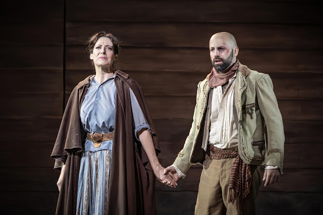 Puccini: <i>La fanciulla de West</i> - Amanda Echalaz, José de Eça - Opera Holland Park, 2026 (Photo: Craig Fuller) Puccini: <i>La fanciulla de West</i> - Amanda Echalaz, José de Eça - Opera Holland Park, 2026 (Photo: Craig Fuller)