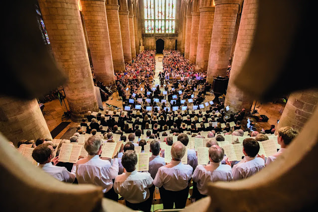 Adrian Partington conducting Mahler's Symphony No. 8 at Gloucester Cathedral as part of the 2022 Cheltenham Music Festival