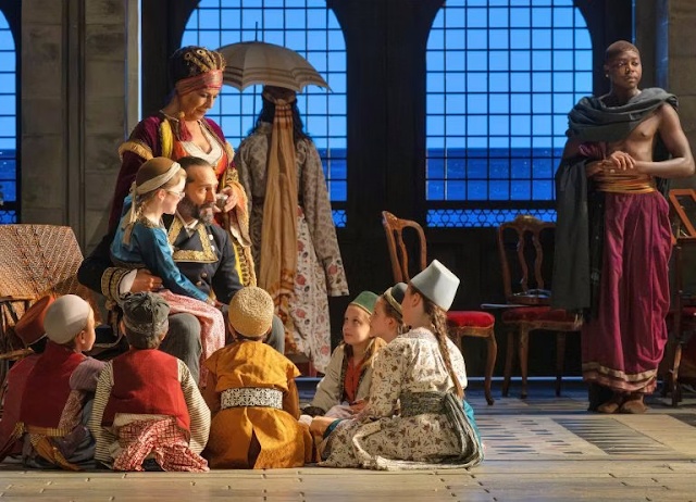 Mozart: Die Entführung aus dem Serail - Pasha Selim (Franck Saurel), Children and Actors (Sirena Tocco and Darryl Mundoma) - Glyndebourne (Photo: Bill Knight) Mozart: Die Entführung aus dem Serail - Pasha Selim (Franck Saurel), Children and Actors (Sirena Tocco and Darryl Mundoma) - Glyndebourne (Photo: Bill Knight)