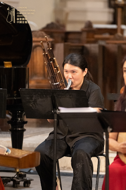 Julia Luo playing the sheng Julia Luo playing the sheng