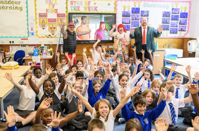 Primary Fours in West Primary School, Paisley with NYCOS Artistic Director and Founder Christopher Bell (with the hat), NYCOS Singing Time presenter Holly Clelland (with the red hair) and acclaimed Scottish tenor Nicky Spence (with the red tie) Primary Fours in West Primary School, Paisley with NYCOS Artistic Director and Founder Christopher Bell (with the hat), NYCOS Singing Time presenter Holly Clelland (with the red hair) and acclaimed Scottish tenor Nicky Spence (with the red tie)