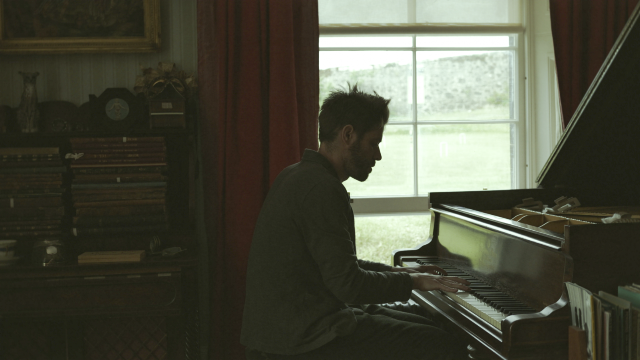 Blair Coron at Margaret Fay Shaw's piano on the Isle of Canna Blair Coron at Margaret Fay Shaw's piano on the Isle of Canna